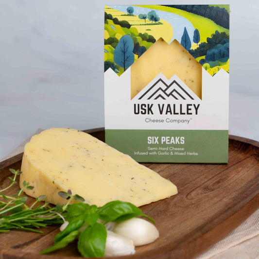Six Peaks Gouda-Style Cheese infused with Garlic and Mixed Herbs